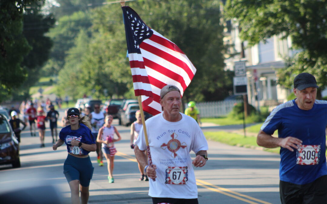 PHOTOS:   New location, same patriotism to start the 4th in the City
